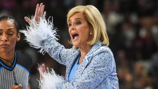 LSU basketball coach Kim Mulkey shouts at her team during a game.